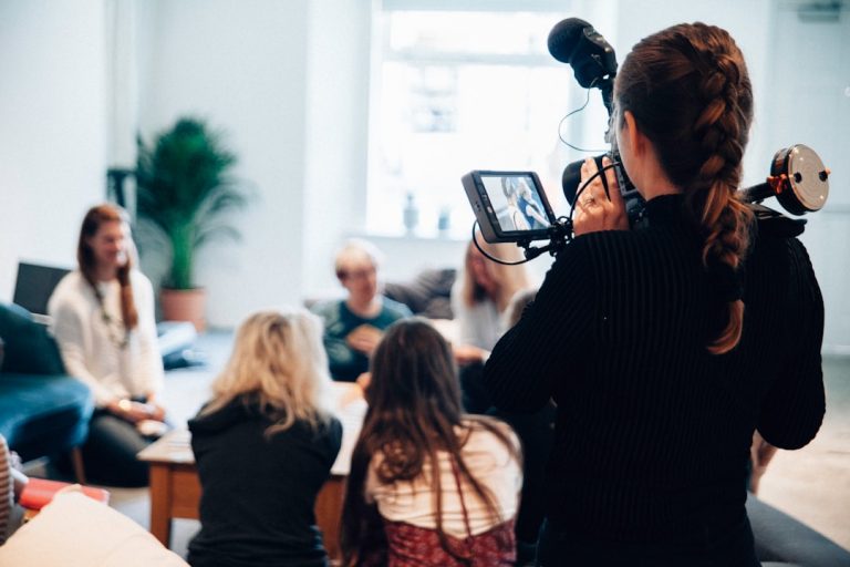 Journalists working in a global newsroom