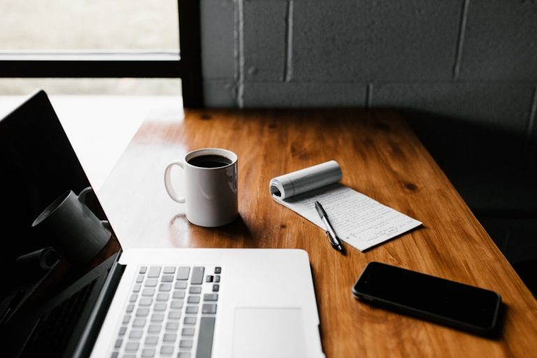 Small business workspace with laptop and documents